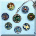 C05. Enameled state quarters, some made into buttons, cufflinks or necklaces. 